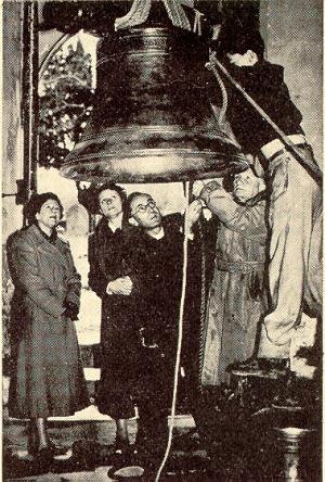 An action photo taken in 1952 and showing the lowering of the bells (5) for recasting into six by Whites of Appleton. This was at the Church of the Assumption, Wavendon. The Cleric is the late Canon Charles Elliot Wigg who was rector there from 1948.
This actually looks more like the installation of the new ring of six.